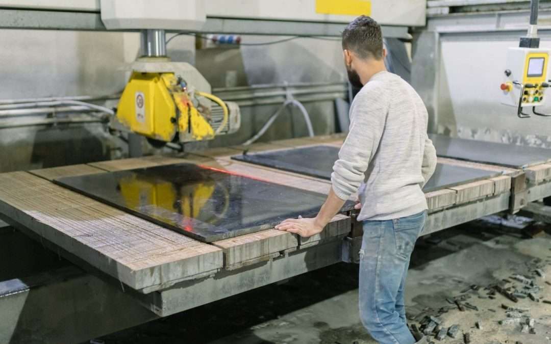A machinist working on a manufacturing floor